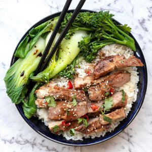 CHILLI PORK STEAKS WITH ASIAN GREENS